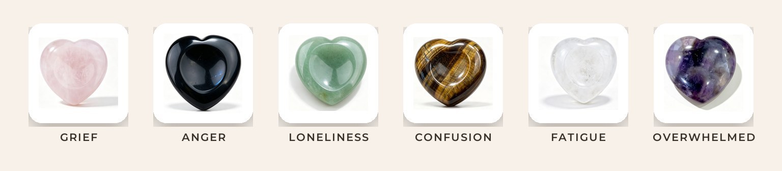 Six RisUni heart-shaped thumb stones in a quiet row — one for each feeling.